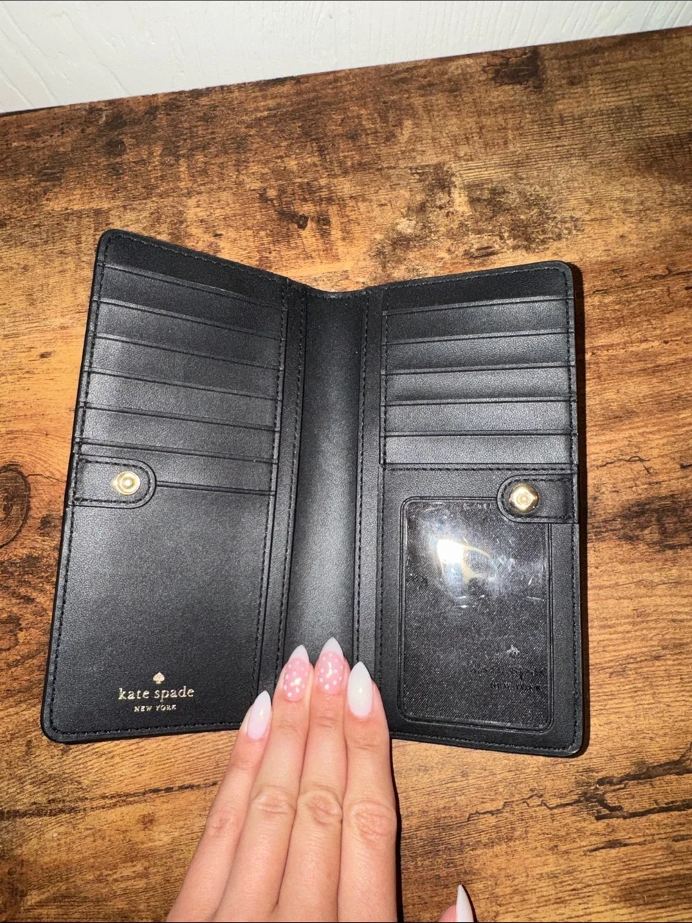 kate spade Black Saffiano Zip Around Wallet with Gold Logo